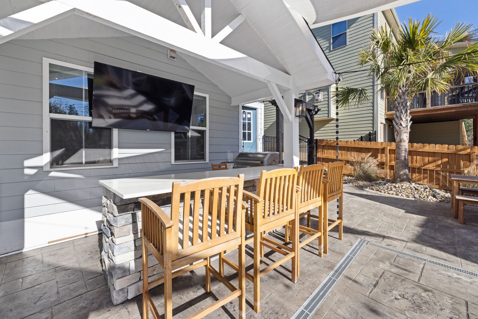 Covered patio with lounge seating and a solid roof